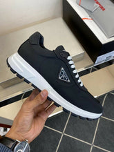 Carregar imagem no visualizador da galeria, Prada PRAX 01 Sneakers Re-Nylon Brushed Leather Black White
