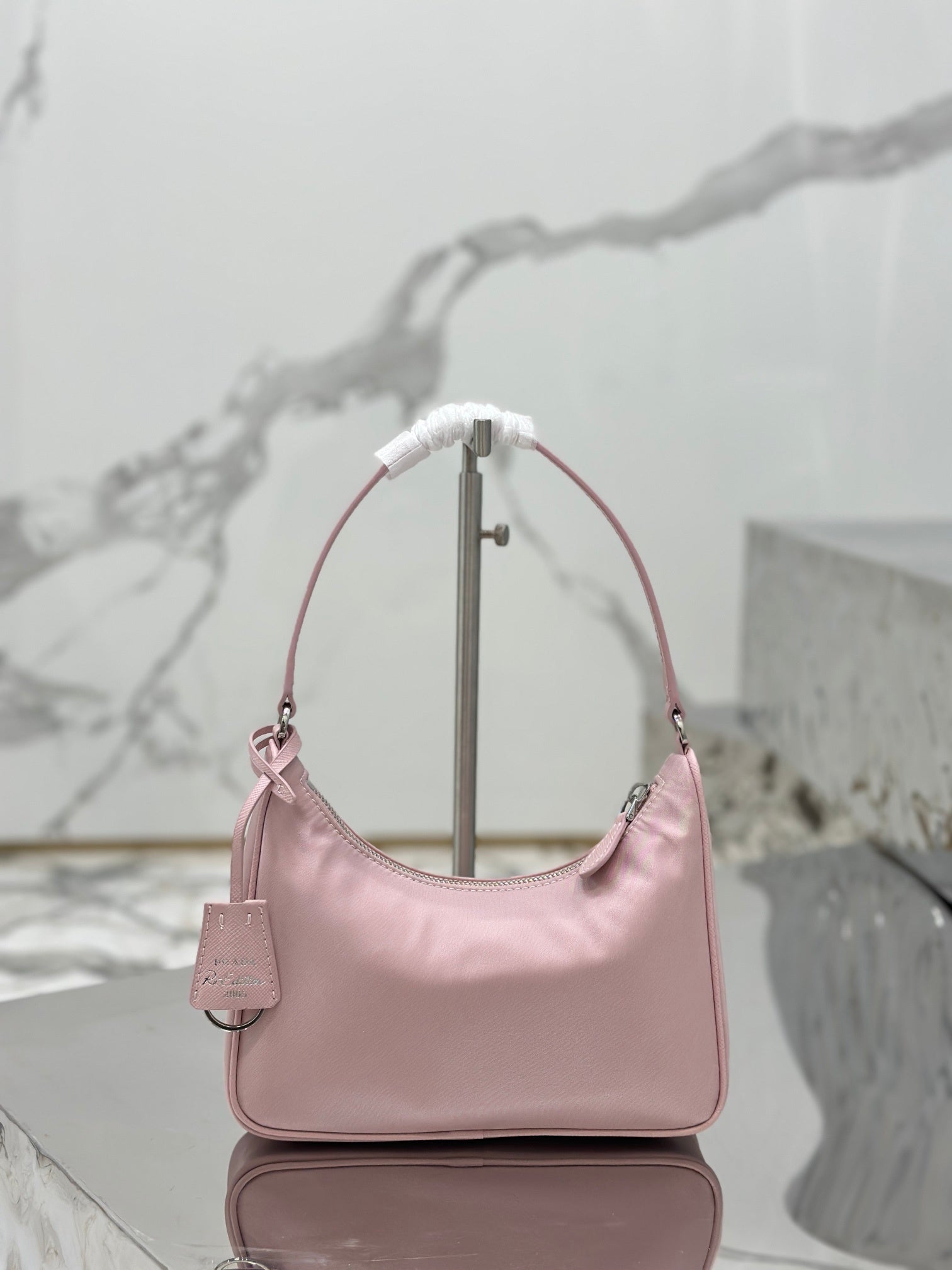Bolsa Prada mini Re-Edition 2000